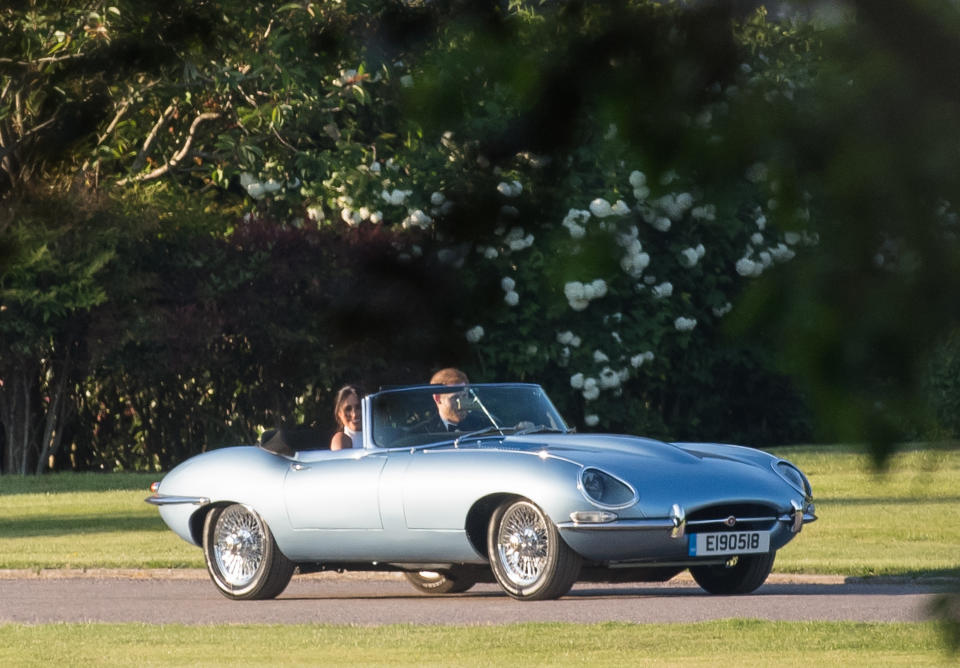 The couple made their way to the reception in a classic Jaguar featuring registration plates including their wedding date. Source: Getty