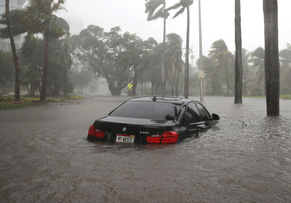 <p><strong>Miami</strong><br>A car is seen in a flooded street as Hurricane Irma passes through on Sept. 10, 2017 in Miami, Fla. Hurricane Irma made landfall in the Florida Keys as a Category 4 storm on Sunday, lashing the state with 130 mph winds as it moves up the coast. (Photo: Joe Raedle/Getty Images) </p>