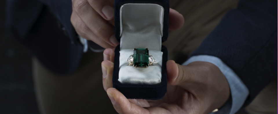 A large emerald-cut emerald ring