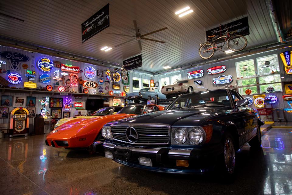 Classic cars, neon signs and sports memorabilia line the showroom of Investment Classics on Thursday, May 19, in Saugatuck.