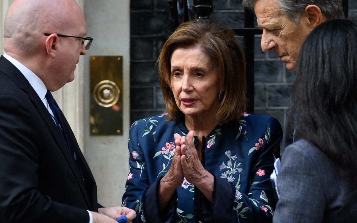 S Ambassador to the UK Philip Reeker (L) speaks with US House Speaker Nancy Pelosi (C) and her husband Paul Pelosi following a meeting with Prime Minister Boris Johnson at Downing Street on September 16, 2021 in London, England. The speaker of the United States House of Representatives is in the UK to participate in the G7 Heads of Parliament Conference this week in Chorley, England - Getty Images