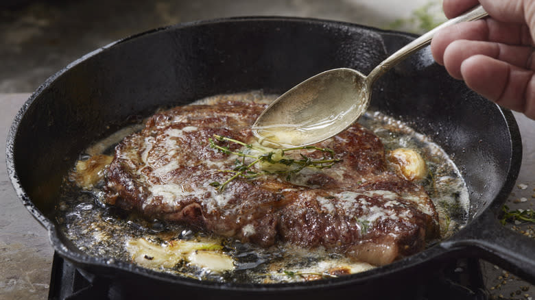 Finishing steak with butter