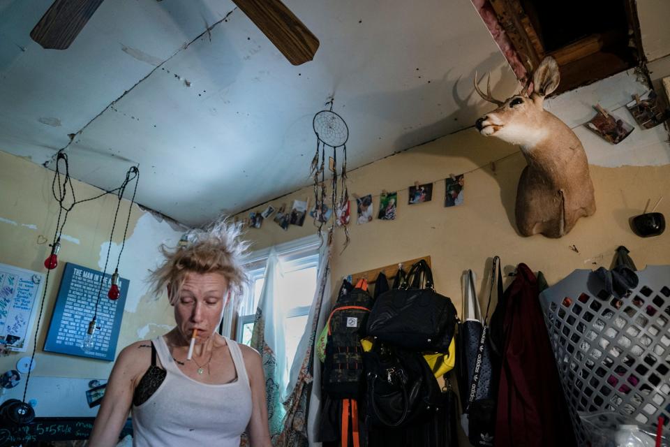 High, Amanda tries to get ready for her day on Friday, July 29, 2022. Amanda decorates her room with personal and found objects including family photos, a dream catcher and a deer head from her dad.