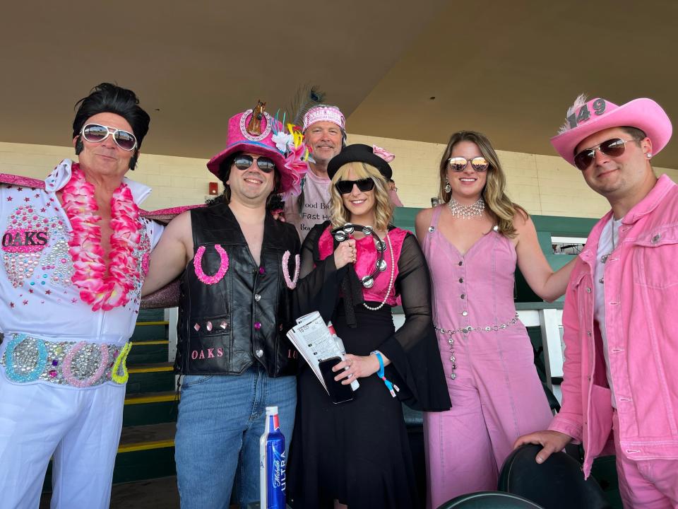 A family created a theme for their Kentucky Oaks outfits — which they've done for the past 10 years. This year it is famous musicians, on Friday, May 5, 2023.