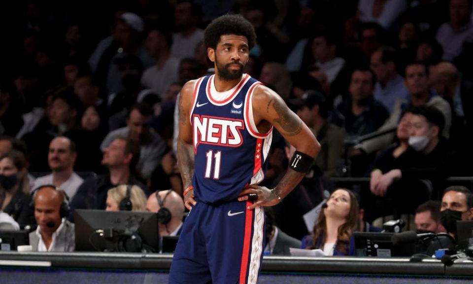 Brooklyn Nets guard Kyrie Irving reacts during the second quarter of Game 4 of the 2022 first round series against the Boston Celtics.