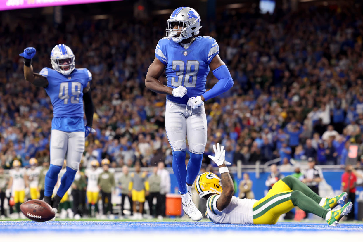 DETROIT, MICHIGAN - NOVEMBER 06: C.J. Moore #38 of the Detroit Lions celebrates after breaking up a pass in the fourth quarter of a game against the Green Bay Packers at Ford Field on November 06, 2022 in Detroit, Michigan. (Photo by Rey Del Rio/Getty Images)