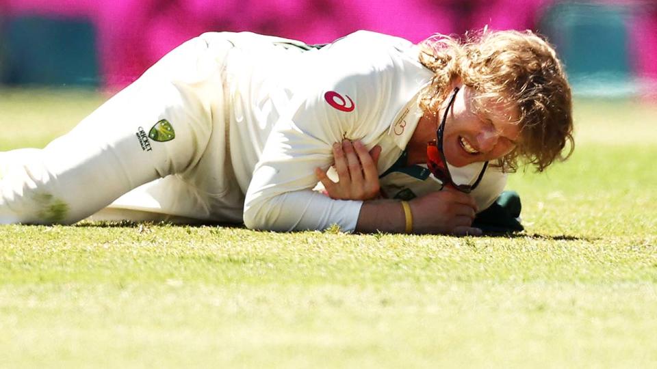 Will Pucovski, pictured here after diving to field a ball at the SCG.