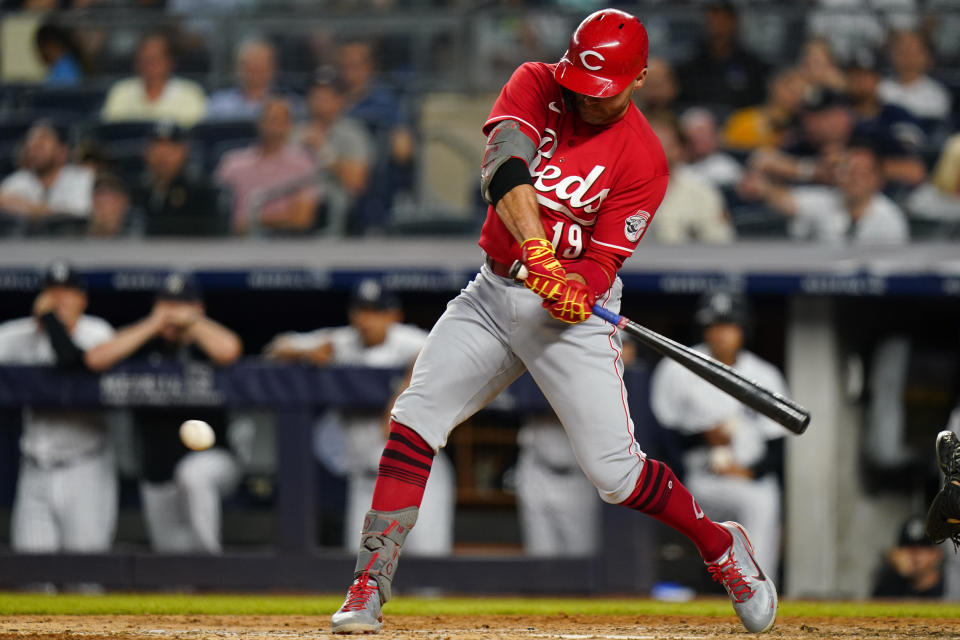 Cincinnati Reds' Joey Votto hits an RBI single during the eighth inning of the team's baseball game against the New York Yankees on Thursday, July 14, 2022, in New York. (AP Photo/Frank Franklin II)