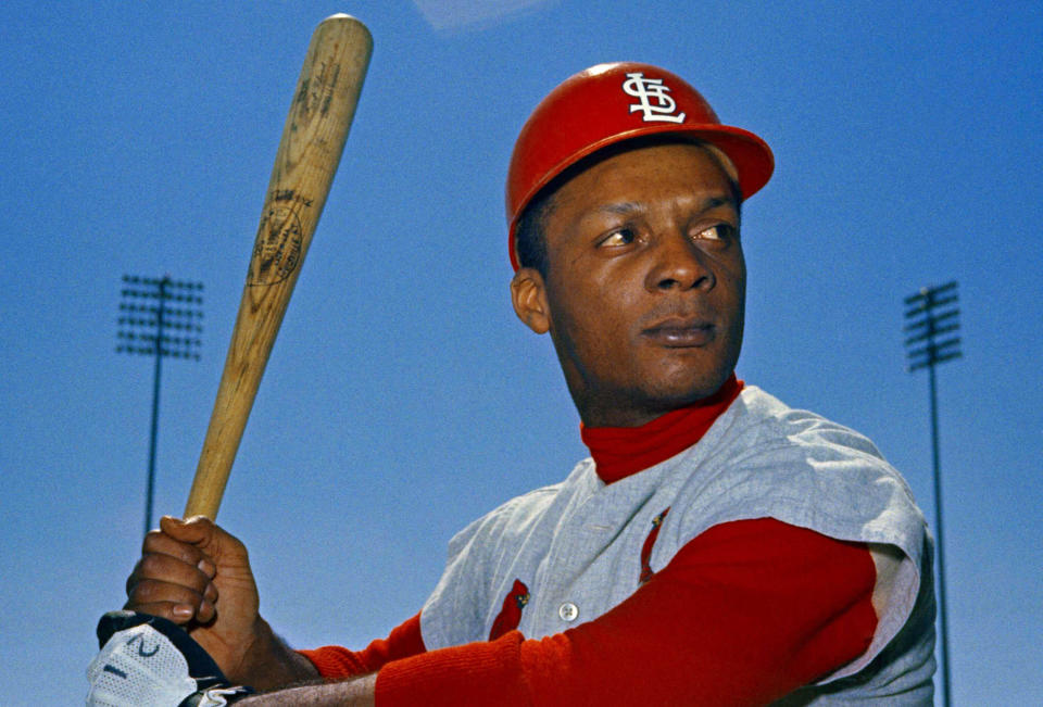 File-This 1968 file photo shows St. Louis Cardinals outfielder Curt Flood. Flood set off the free-agent revolution 50 years ago Tuesday, Dec. 24, 2019, with a 128-word letter to baseball Commissioner Bowie Kuhn, two paragraphs that pretty much ended the career of a World Series champion regarded as among the sport's stars but united a union behind his cause. (AP Photo/File)