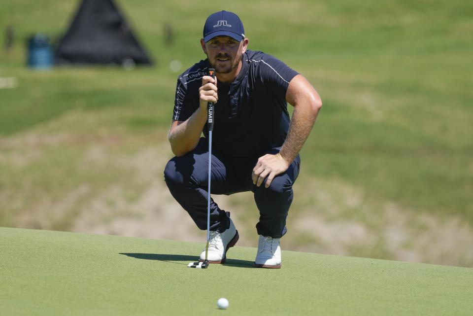Matt Wallace, of England, studies his putt at the 9th green during the second round of the Mexico Open golf tournament in Puerto Vallarta, Mexico, Friday, Feb. 23, 2024. (AP Photo/Fernando Llano)