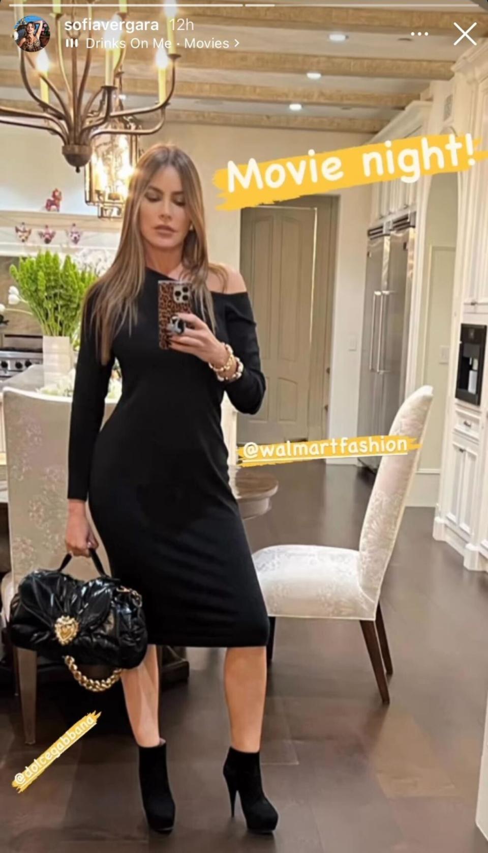 Sofia Vergara via Instagram stories in Walmart dress, chunky ankle boots and Dolce & Gabbana handbag.