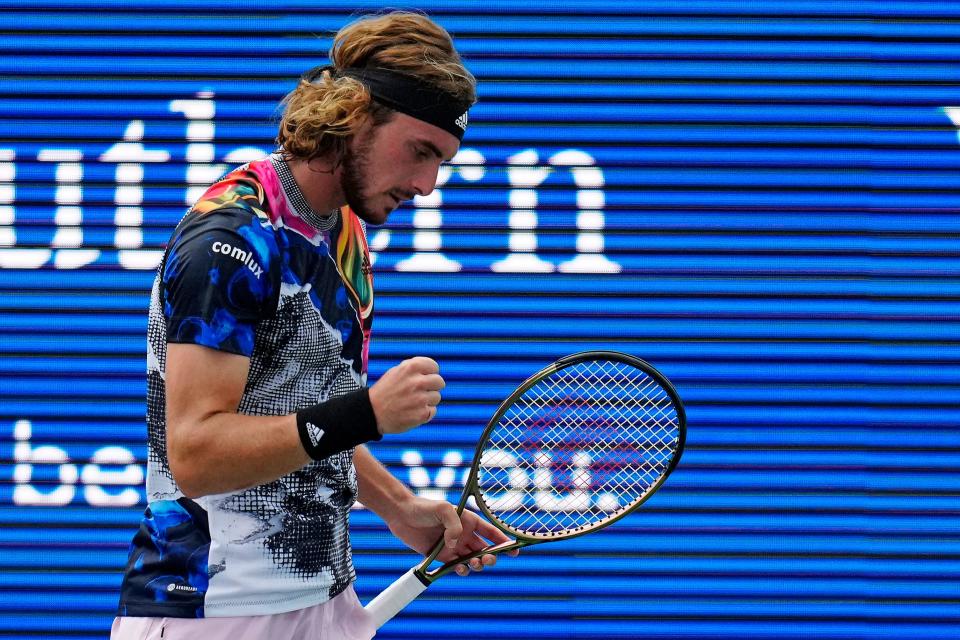 Stefanos Tsitsipas celebrates a point in the first set of the quarterfinal match between John Isner (USA) and Stefanos Tsitsipas (GRE) at the Western & Southern Open at the Lindner Family Tennis Center in Mason, Ohio, on Friday, Aug. 19, 2022.