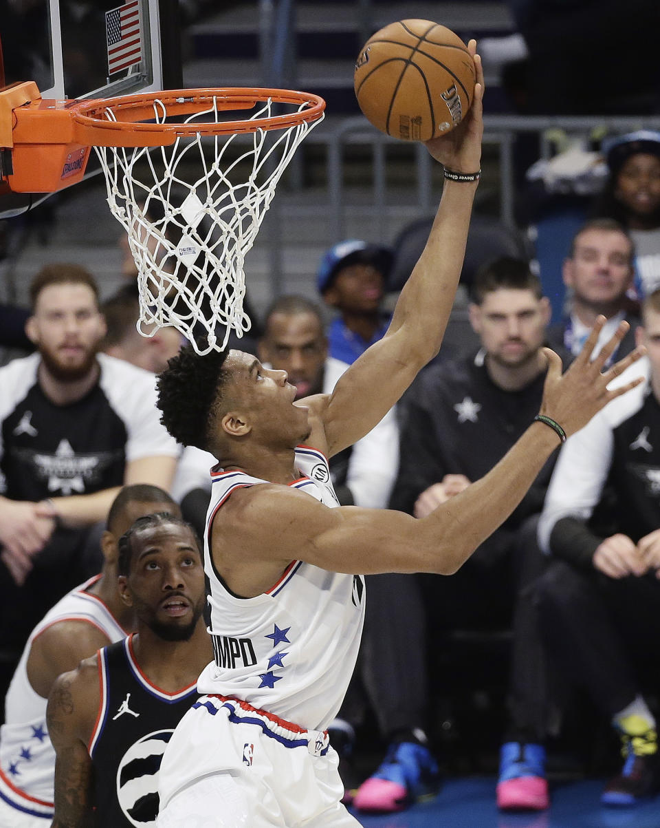 Team Giannis' Giannis Antetokounmpo, of the Milwaukee Bucks dunks against Team LeBron during of the first half of an NBA All-Star basketball game, Sunday, Feb. 17, 2019, in Charlotte, N.C. (AP Photo/Gerry Broome)