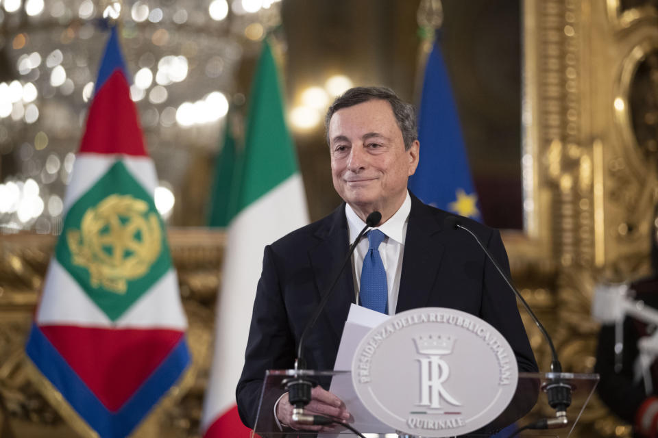 Former European Central Bank president Mario Draghi speaks to the media after accepting a mandate to form Italy's new government from Italian President Sergio Mattarella at the Rome's Quirinale Presidential Palace, Wednesday Feb. 3, 2021. (AP Photo/Alessandra Tarantino, Pool)