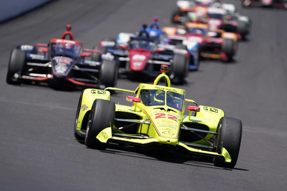 Simon Pagenaud, of France, drives into Turn 1 during the Indianapolis 500 auto race at Indianapolis Motor Speedway, Sunday, May 30, 2021, in Indianapolis. (AP Photo/Darron Cummings)