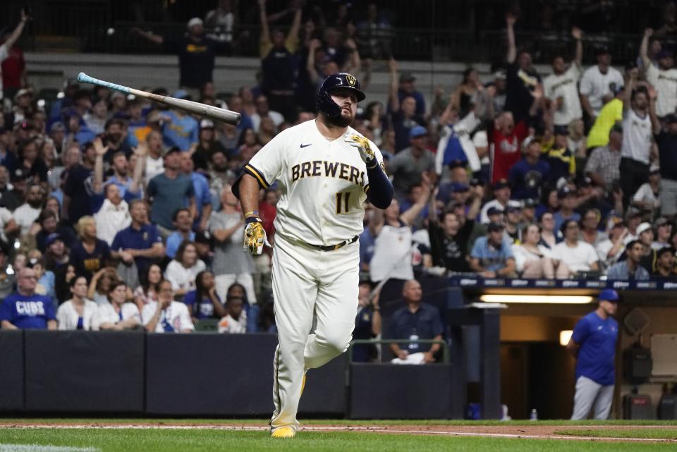 Milwaukee Brewers' Rowdy Tellez hits a two-run home run during the first inning of a baseball game against the Chicago Cubs Tuesday, July 5, 2022, in Milwaukee. (AP Photo/Morry Gash)