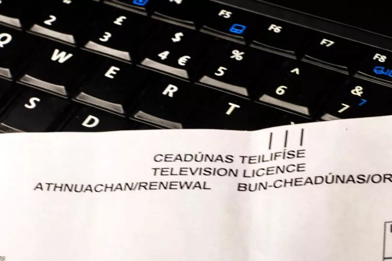 photo of a tv licence on a computer keyboard