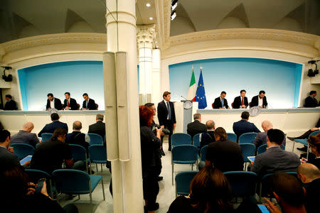 Italy's Minister of Labor and Industry Luigi Di Maio, Prime Minister Giuseppe Conte and Interior Minister Matteo Salvini attend a news conference after a cabinet meeting at Chigi Palace in Rome, Italy, October 20 2018. REUTERS/Remo Casilli