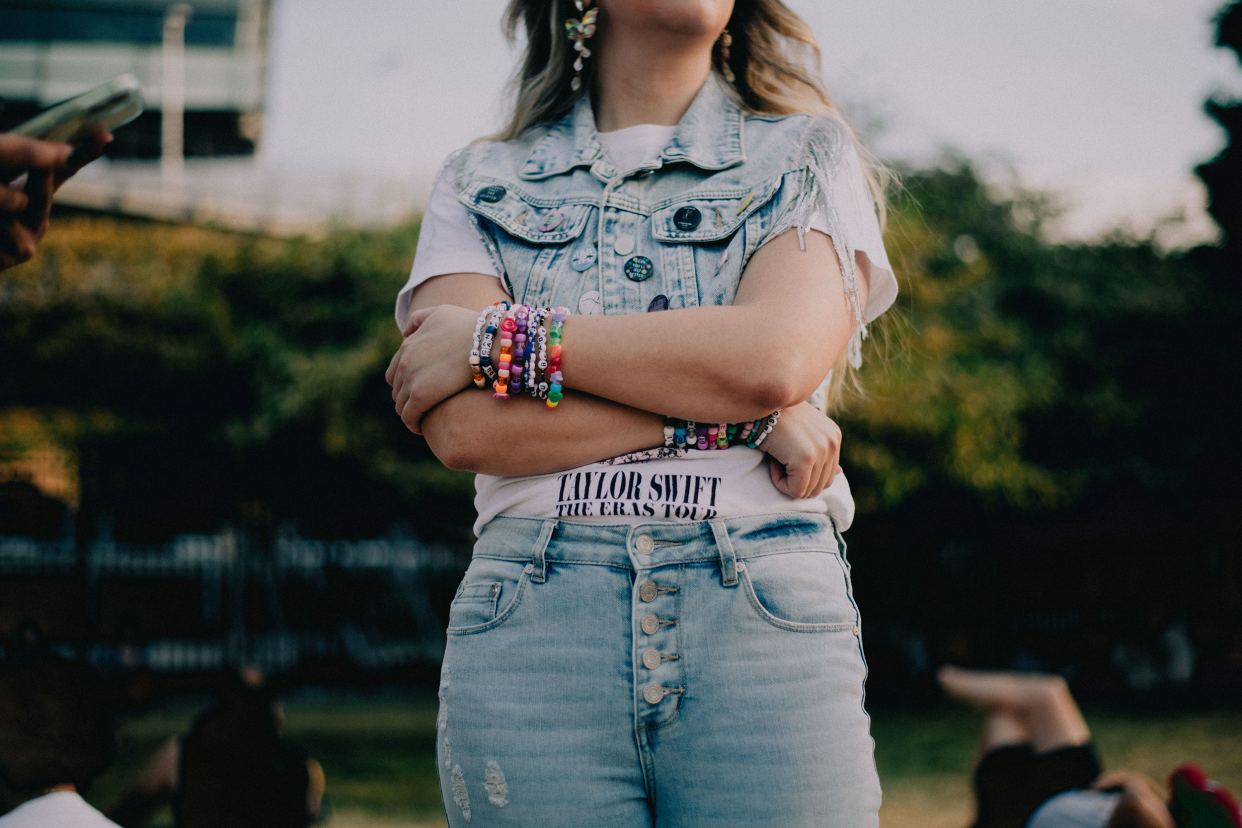 Samantha Funk, 28, spent her Friday night outside Soldier Field in Chicago to listen to Taylor Swift's concert, share friendship bracelets and dance. (Akilah Townsend for NBC News)