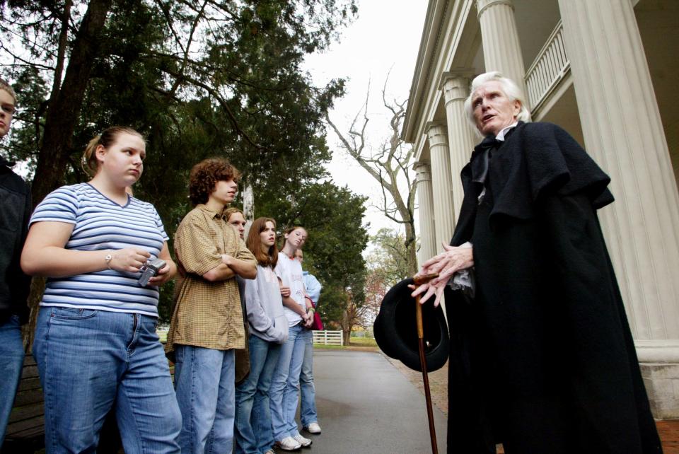 Dave McArdle, right, historical interpreter acting as Andrew Jackson, talks to kids visiting from Gilbert, Iowa, as they tour the Hermitage in 2004.