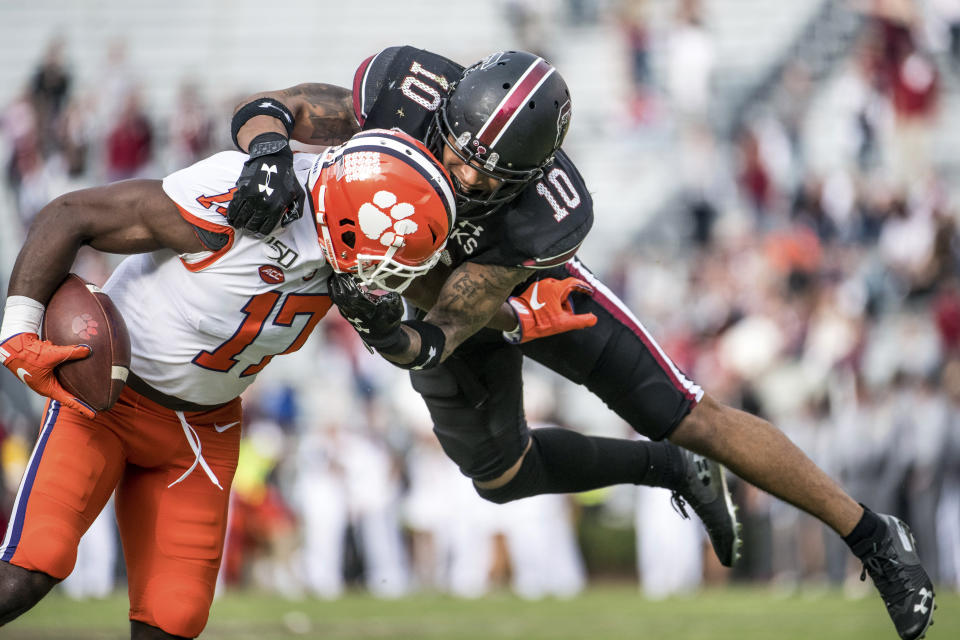 South Carolina defensive back R.J. Roderick (10) tackles Clemson wide receiver Cornell Powell (17) during the second half of an NCAA college football game Saturday, Nov. 30, 2019, in Columbia, S.C. Clemson defeated South Carolina 38-3. (AP Photo/Sean Rayford)