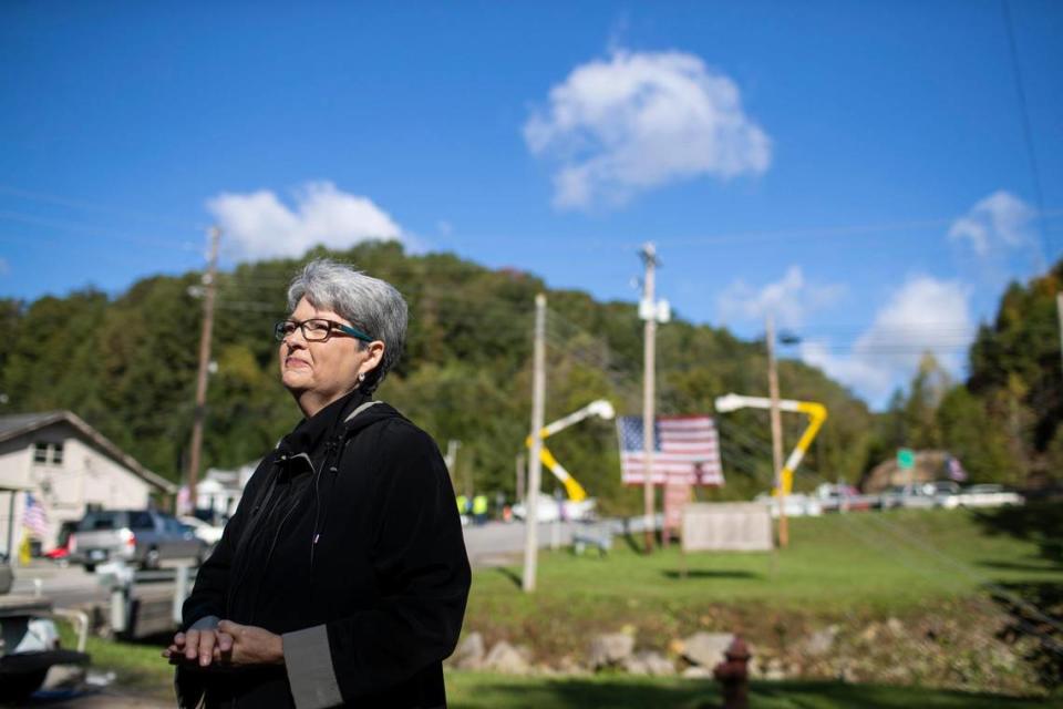 Genevieve Palm, niece of Army Pfc. Berton J. McQueen during a public visitation at the Veterans Memorial in McKee, Ky., Saturday, October 16, 2021.