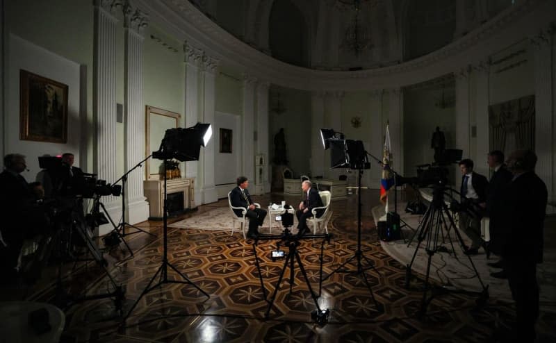 Russian President Vladimir Putin speaks during an interview with US journalist Tucker Carlson. -/Kremilin Pool/dpa