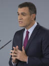 Spain's caretaker Prime Minister Pedro Sanchez makes a statement at the Moncloa Palace in Madrid, Spain, Wednesday, Oct. 16, 2019. Spain's government met other national political leaders Wednesday and said it would do whatever it takes to stamp out violence in Catalonia, where clashes between regional independence supporters and police have injured more than 200 people in two days after Spain's Supreme Court on Monday handed nine separatist Catalan leaders lengthy prison sentences for their part in an October 2017 effort to achieve independence. (AP Photo/Paul White)