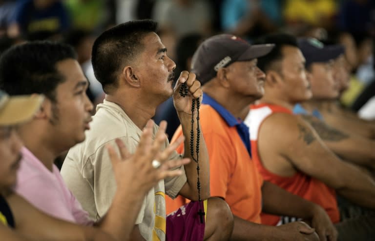 Fans of Manny Pacquiao watch the fight in Manila, where he is idolised