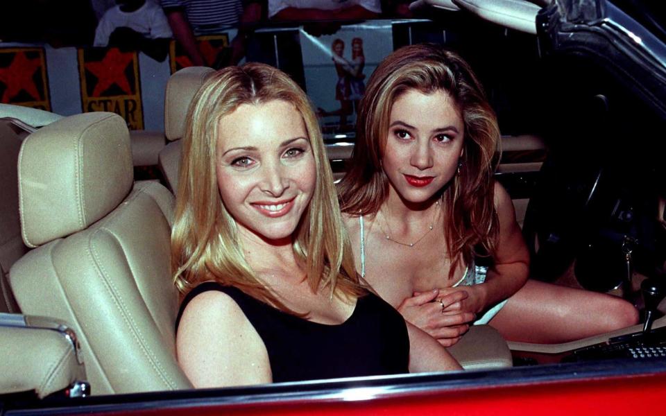 Lisa Kudrow and Mira Sorvino at the premiere of Romy and Michele's High School Reunion - Credit: Reuters