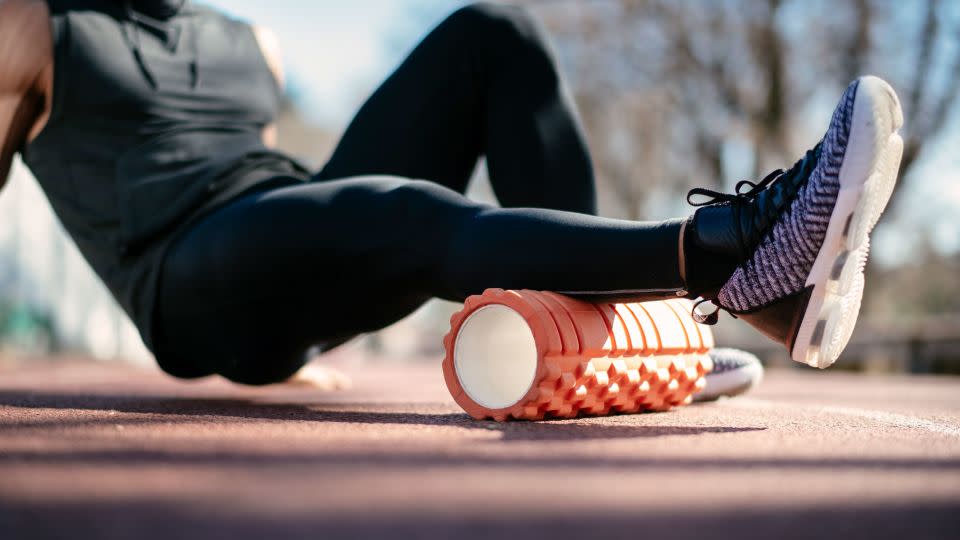 Foam rolling is a common technique in fascia training and can help improve range of motion, according to research. - Boris Jovanovic/iStockphoto/Getty Images
