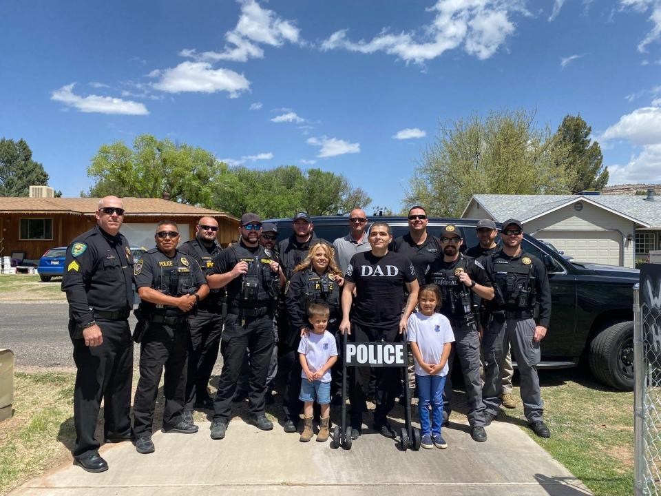 Sgt. Preston Brogdon (in DAD t-shirt) was left with debilitating injuries after he was shot by a fleeing man on Feb. 9, 2022. Two years later, his department terminated him without offering him medical retirement.