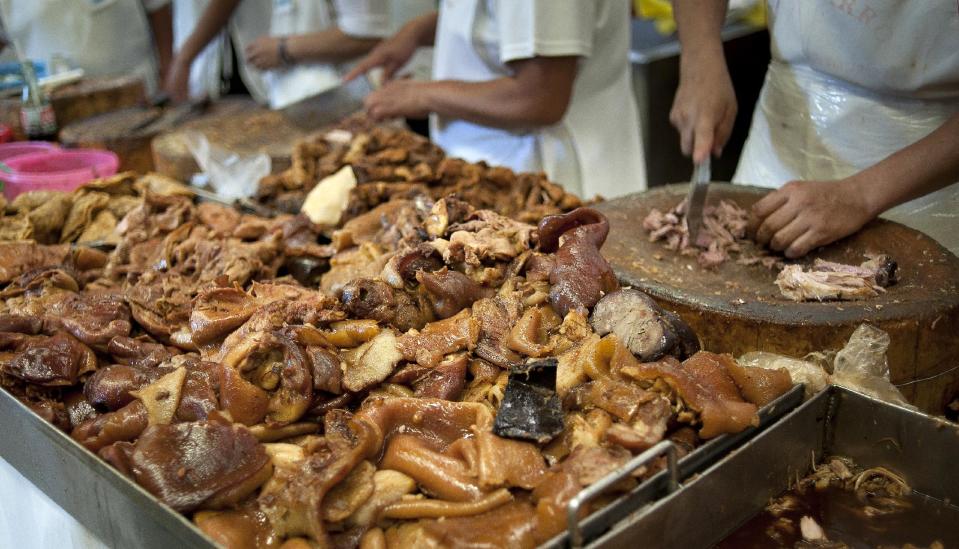 La carne de cerdo será una de las más afectadas por la guerra comercial con Estados Unidos. En la imagen, un local de Ciudad de México donde preparan tacos y tortas de carne de cerdo y res. (AFP/archivo | Omar Torres)