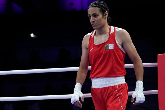 Imane Khelif post-fight in the boxing ring with her headguard and gloves off