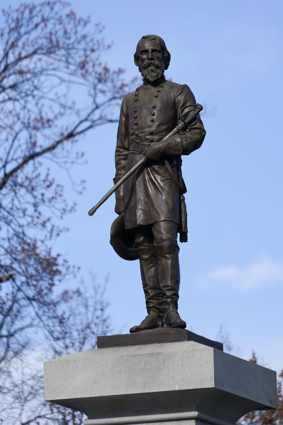 FILE - The monument of confederate General A.P. Hill, which contains his remains, is in the middle of a traffic circle on Arthur Ashe Blvd. Thursday Jan. 6, 2022, in Richmond, Va. Work to relocate Richmond’s final city-owned Confederate monument should start this week after a judge refused a request to delay the removal of the statue of Gen. A.P. Hill from its prominent spot in Virginia's capital, an official said. (AP Photo/Steve Helber, File)