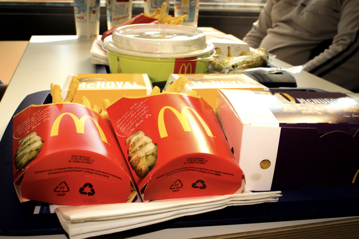 Lunch at McDonalds. Fries, salad, burger and milkshakes