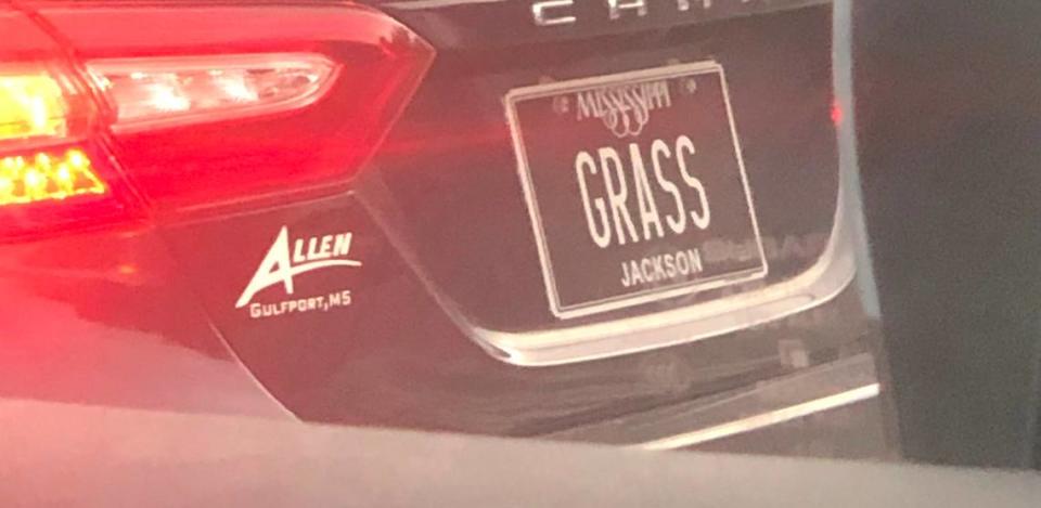 Wonder what sort of grass this driver is referring to with this plate that reads “GRASS”. Hannah Ruhoff/Sun Herald