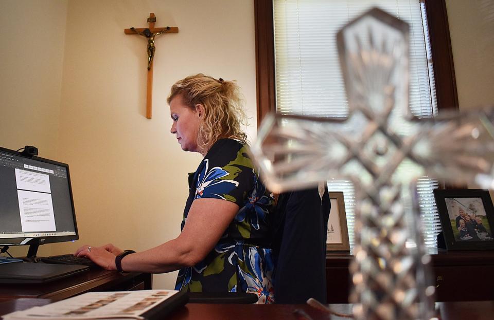 Carolyn Shipp, director of the Diocese of Fall River's Office of Safe Environment, works in her office at the chancery in Fall River on Tuesday, July 16, 2024.