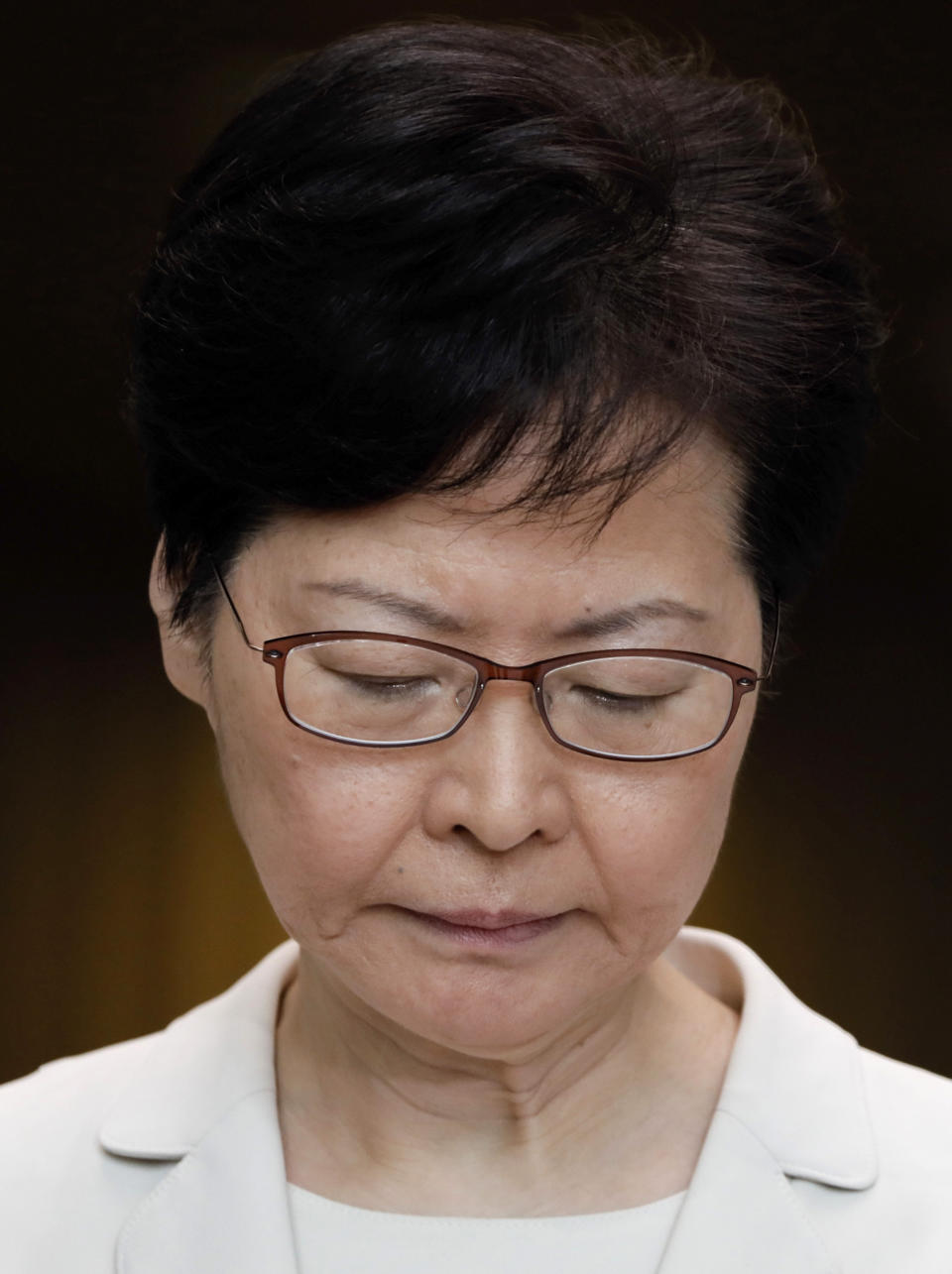 Hong Kong Chief Executive Carrie Lam pauses during a press conference at the government building in Hong Kong, Thursday, Sept. 5, 2019. Lam says the extradition bill that sparked months of demonstrations will be formally withdrawn in the legislative council without the need for debate or vote. (AP Photo/Vincent Yu)