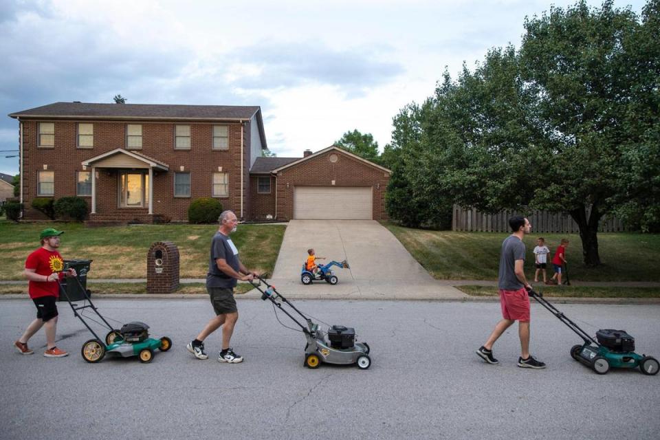 The Wilmore Lawnmower Brigade rehearses precision maneuvers ahead of Monday’s Fourth of July parade in Wilmore, Ky.