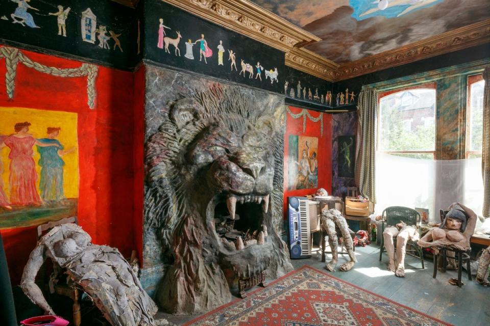 Another room features a giant lion’s head as the fireplace (Historic England Archive 2024/PA Wire)