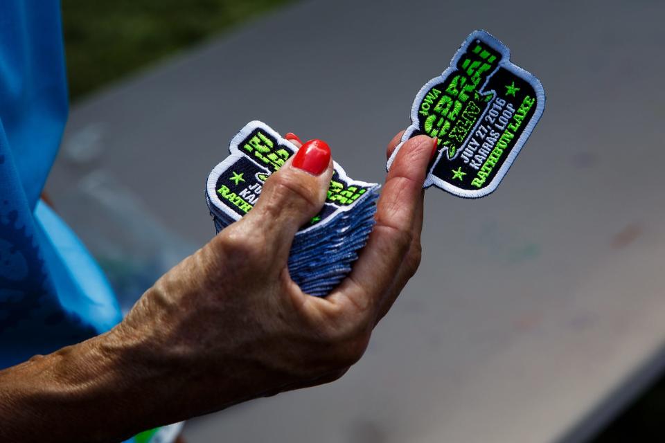 Karras loop patches are handed out at Honey Creek Resort on Wednesday, July 27, 2016 in Moravia.