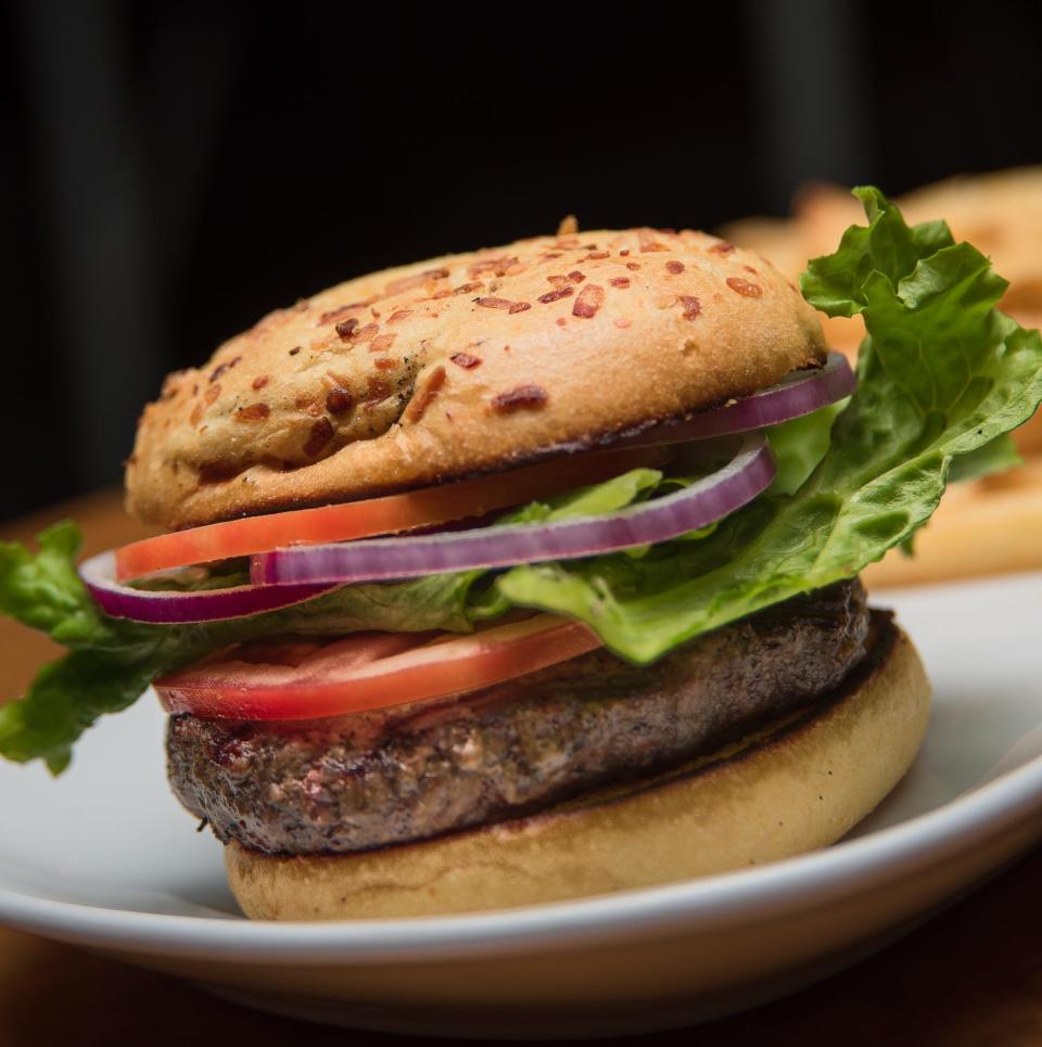 Gecko’s Grill & Pub, with multiple locations in Sarasota and Manatee, offers USDA Choice Angus Chuck burgers with plenty of toppings options.