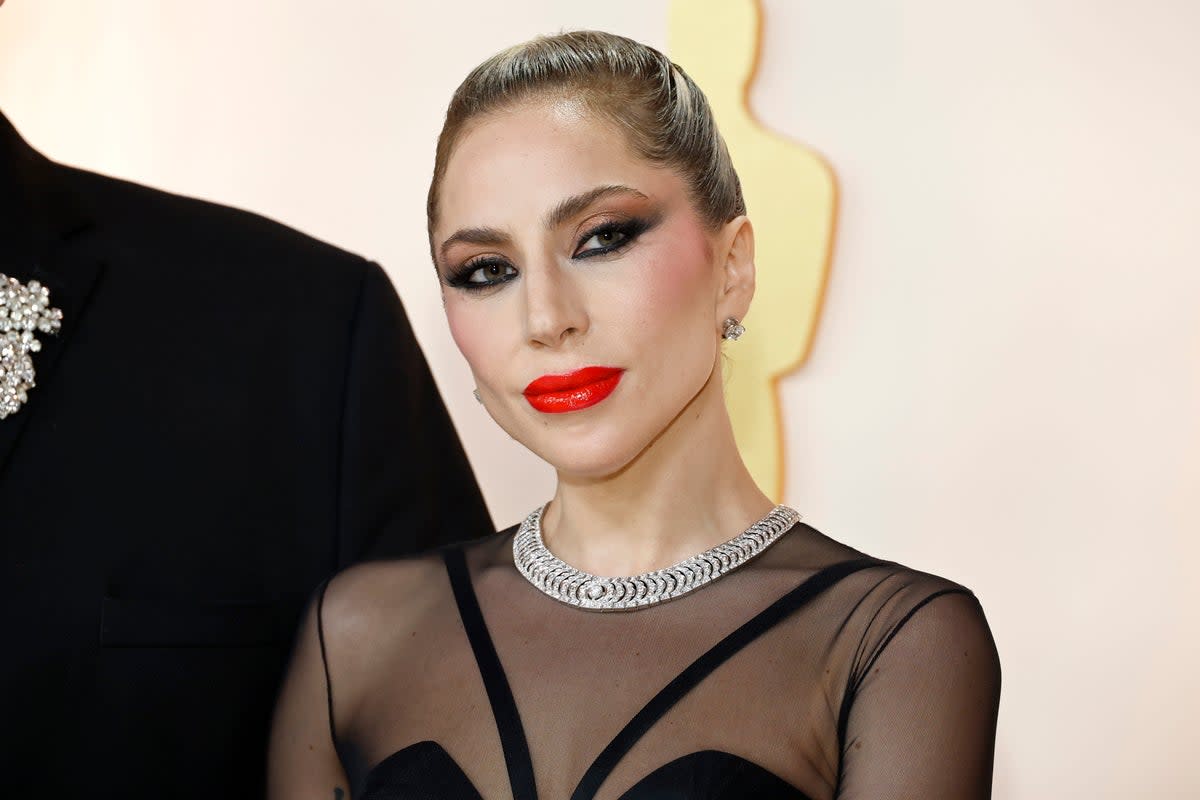 Lady Gaga rushed to help a photographer on the Oscars red carpet   (Getty Images)