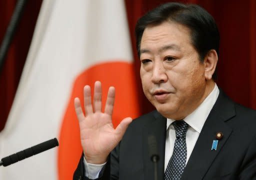 Japanese Prime Minister Yoshihiko Noda answers questions during a press conference at his official residence in Tokyo. Noda dissolved the lower house of parliament on Friday for an election next month, in a political gamble widely expected to strip his centre-left party of power