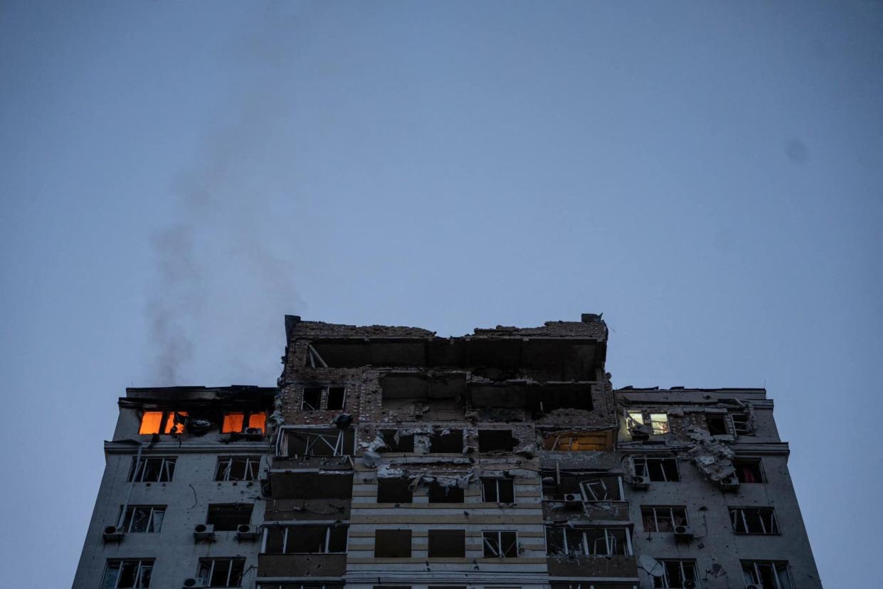 An apartment building burns after being damaged during a massive Russian drone strike (via REUTERS)
