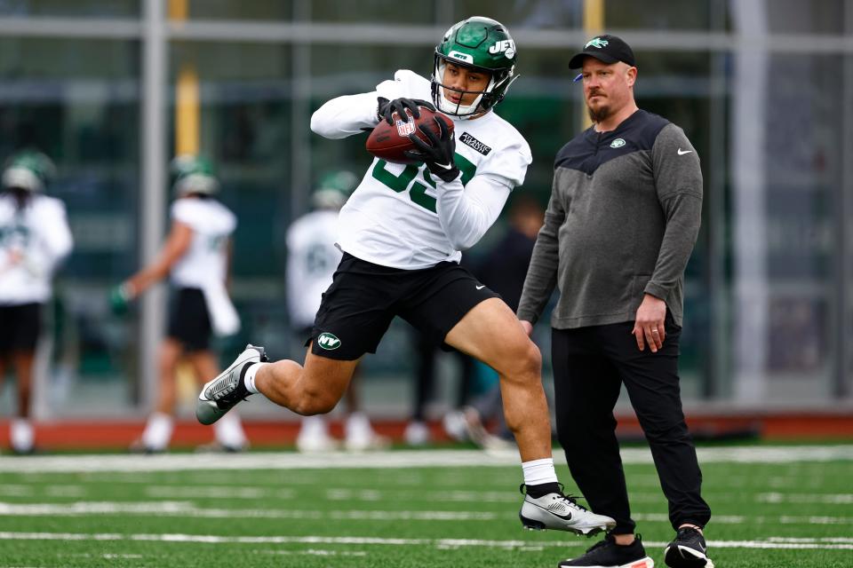 New York Jets running back Wayne Taulapapa makes a catch during the team's rookie minicamp.