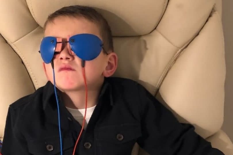 Reggie, 7, needs to return to Germany to undergo a second round of pioneering treatment to enable him to regain his eyesight -Credit:Lee Aslin