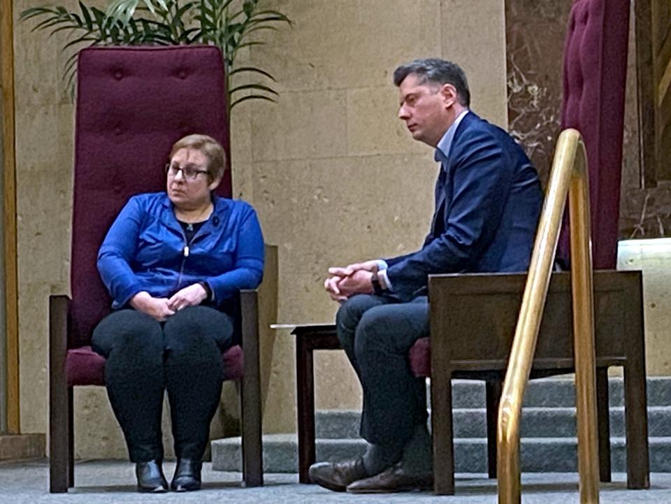Shira Goodman, a leader with the Anti-Defamation League-Texoma regional chapter, left, and Oklahoma City Mayor David Holt listen as a community member asks a question during "A Conversation About Antisemitism" at Temple B'nai Israel in Oklahoma City.
