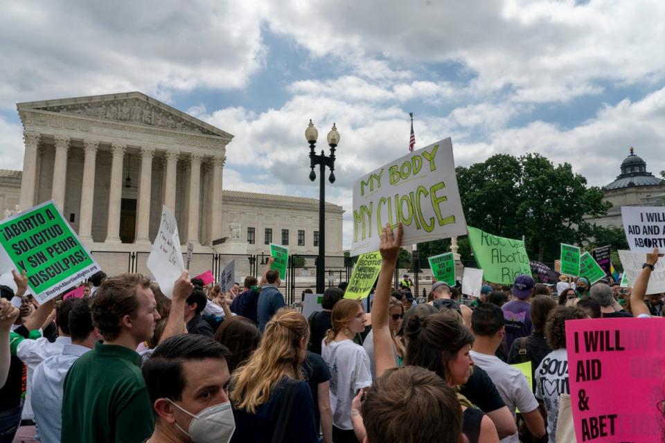 Pro-abortion demonstrators outside the Supreme Court on Friday (Associated Press)